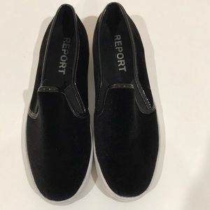 Report slide on black shoes
